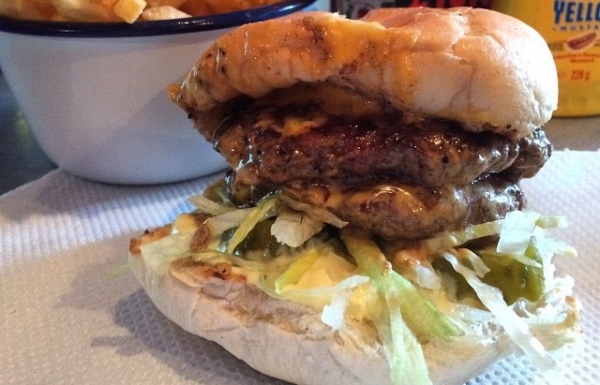 A delicious dead hippie burger, oozing with cheese, dead hippy sauce, onions and lettuce.
