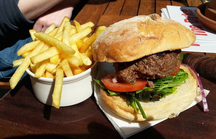 The burger and some fries from the Dyke. We were outside so it's sunny.
